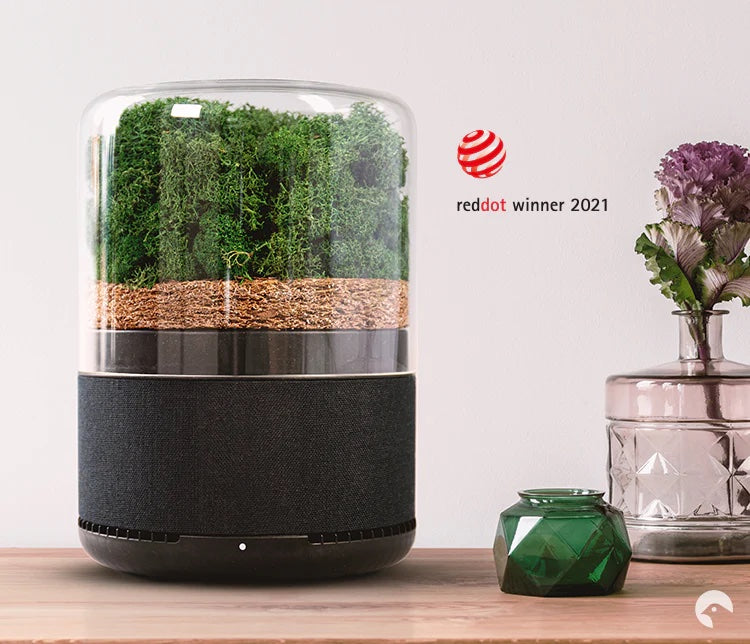 Briiv air filter next to the Red Dot logo for winning the Red Dot design award in 2021. 